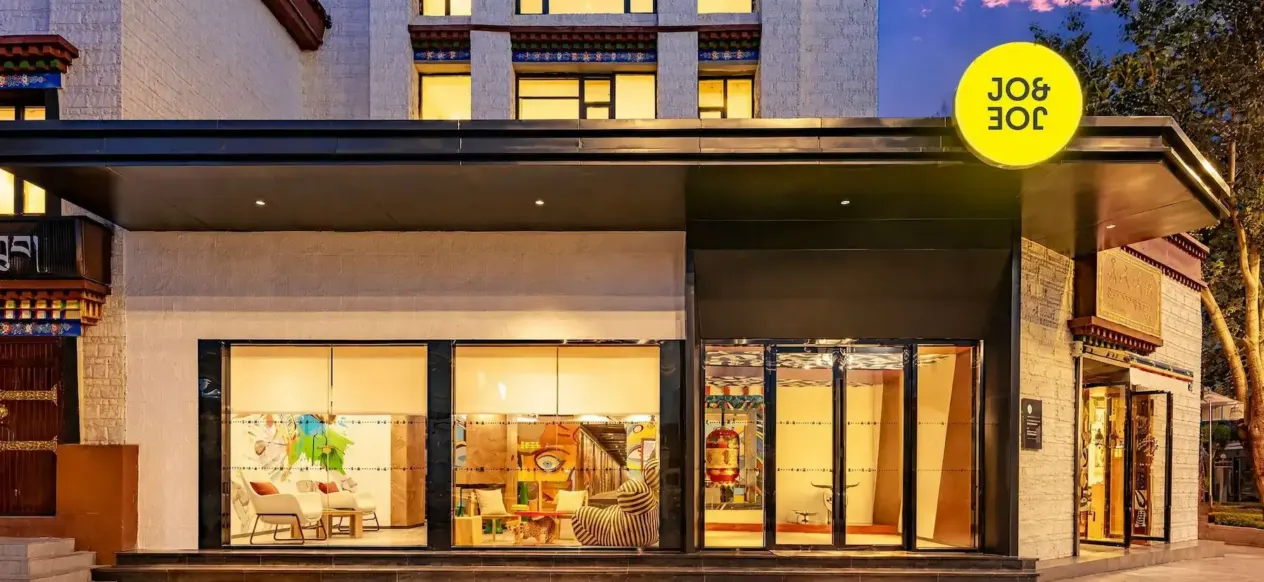 Glass storefront and entrance of JO&JOE Lhasa Jokhang Temple
